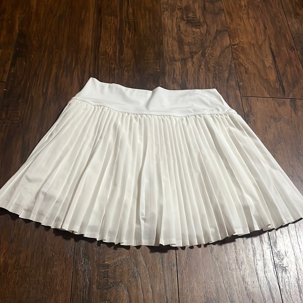 White pleated skirt